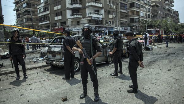 FILE -- In this June 29, 2015 file photo, Egyptian policemen stand guard at the site of a bombing that killed Egypt’s top prosecutor, Hisham Barakat, who oversaw cases against thousands of Islamists, in Cairo, Egypt - Sputnik International