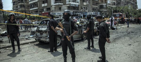 FILE -- In this June 29, 2015 file photo, Egyptian policemen stand guard at the site of a bombing that killed Egypt’s top prosecutor, Hisham Barakat, who oversaw cases against thousands of Islamists, in Cairo, Egypt FILE -- In this June 29, 2015 file photo, Egyptian policemen stand guard at the site of a bombing that killed Egypt’s top prosecutor, Hisham Barakat, who oversaw cases against thousands of Islamists, in Cairo, Egypt - Sputnik International