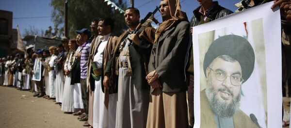 Shiite rebels, known as Houthis, hold a poster of Hezbollah leader Sheikh Hassan Nasrallah during a gathering to show their support to Hezbollah in Sanaa, Yemen, Thursday, March 3, 2016 Shiite rebels, known as Houthis, hold a poster of Hezbollah leader Sheikh Hassan Nasrallah during a gathering to show their support to Hezbollah in Sanaa, Yemen, Thursday, March 3, 2016 - Sputnik International