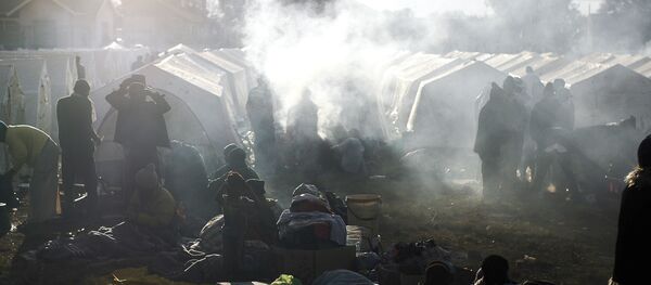 An informal refugee camp (File) An informal refugee camp (File) - Sputnik International
