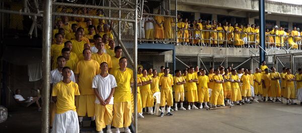 Members of the Mara 18 gang, attend a mass at the Izalco Penitenciary in the city of Izalco, 70 Km west of San Salvador on April 13, 2012 Members of the Mara 18 gang, attend a mass at the Izalco Penitenciary in the city of Izalco, 70 Km west of San Salvador on April 13, 2012 - Sputnik International