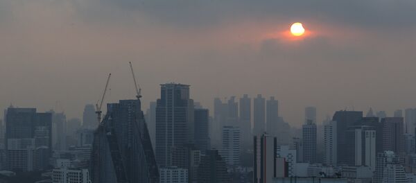 A partial solar eclipse is seen in Bangkok, Thailand, March 9, 2016. A partial solar eclipse is seen in Bangkok, Thailand, March 9, 2016. - Sputnik International
