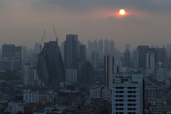 A partial solar eclipse is seen in Bangkok, Thailand, March 9, 2016. A partial solar eclipse is seen in Bangkok, Thailand, March 9, 2016. - Sputnik International