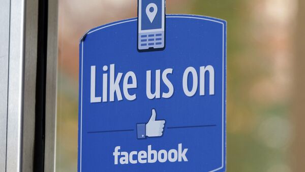 FILE - In this Dec. 13, 2011 file photo, a sign with Facebook's Like logo is posted at Facebook headquarters near the office for the company's User Operations Safety Team in Menlo Park, Calif. - Sputnik International