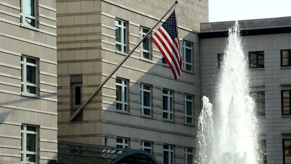 The US national flag is displayed outside the building of the US embassy in Berlin - Sputnik International