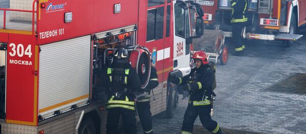 Officers at the Fire Control and Rescue Department of the Russian Emergency Ministry Officers at the Fire Control and Rescue Department of the Russian Emergency Ministry - Sputnik International