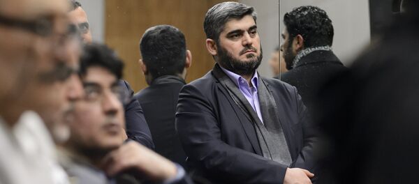 Chief negotiator for the main Syrian opposition body and rebel group Army of Islam, Mohammed Alloush (C) stands during a press conference after Syrian peace talks on February 3, 2016 in Geneva. (File) Chief negotiator for the main Syrian opposition body and rebel group Army of Islam, Mohammed Alloush (C) stands during a press conference after Syrian peace talks on February 3, 2016 in Geneva. (File) - Sputnik International