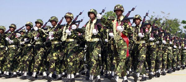 In this photo taken on March. 27, 2012, Myanmar soldiers march during a ceremony to mark the country's 67th Armed Forces Day in Naypyitaw, Myanmar In this photo taken on March. 27, 2012, Myanmar soldiers march during a ceremony to mark the country's 67th Armed Forces Day in Naypyitaw, Myanmar - Sputnik International