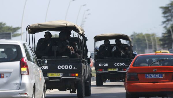 Security forces drive towards Grand Bassam in Abidjan, Ivory Coast, March 13, 2016 - Sputnik International