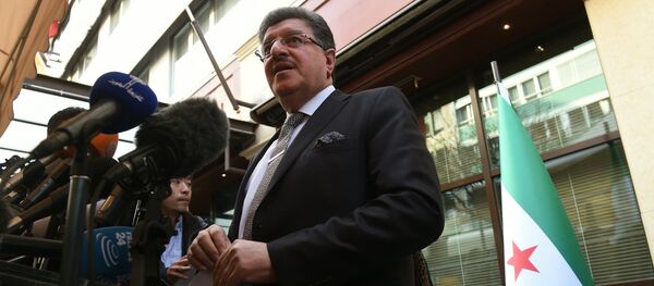 High Negotiations Committee (HNC) spokesman Salem al-Meslet speaks during a press conference on the eve of the second round of Syrian peace talks in Geneva on March 13, 2016 High Negotiations Committee (HNC) spokesman Salem al-Meslet speaks during a press conference on the eve of the second round of Syrian peace talks in Geneva on March 13, 2016 - Sputnik International
