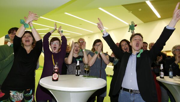 Greens party party supporters celebrate following first exit polls in the state election in Baden-Wuerttemberg in Stuttgart, Germany, March 13, 2016 - Sputnik International