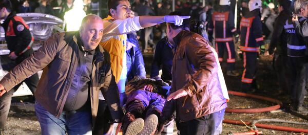 Rescuers carry a victim on a stretcher at the scene of a blast in Ankara on March 13, 2016. Rescuers carry a victim on a stretcher at the scene of a blast in Ankara on March 13, 2016. - Sputnik International