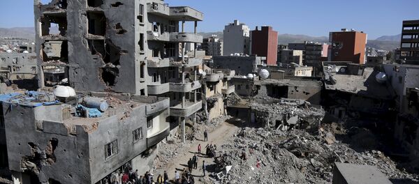 Buildings, which were damaged during the security operations and clashes between Turkish security forces and Kurdish militants, are seen in the southeastern town of Cizre in Sirnak province, Turkey March 2, 2016 Buildings, which were damaged during the security operations and clashes between Turkish security forces and Kurdish militants, are seen in the southeastern town of Cizre in Sirnak province, Turkey March 2, 2016 - Sputnik International