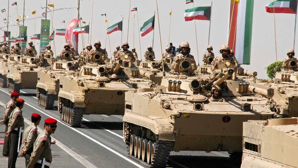 Kuwaiti armed forces sit on top of their tank during a military parade attended by the Emir of Kuwait Sheikh Sabah al-Ahmad al-Jaber al-Sabah in Kuwait City, 07 March 2007 - Sputnik International