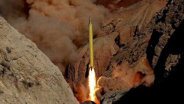 A ballistic missile is launched and tested in an undisclosed location, Iran, in this handout photo released by Farsnews on March 9, 2016 - Sputnik International