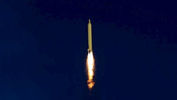 A ballistic missile is launched and tested in an undisclosed location, Iran, in this handout photo released by Farsnews on March 9, 2016 - Sputnik International