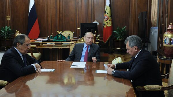 March 16, 2016. President of Russia Vladimir Putin, centre, Russian Minister of Foreign Affairs Sergey Lavrov, left, and Russian Defense Minister Sergey Shoygu during their meeting in the Kremlin - Sputnik International