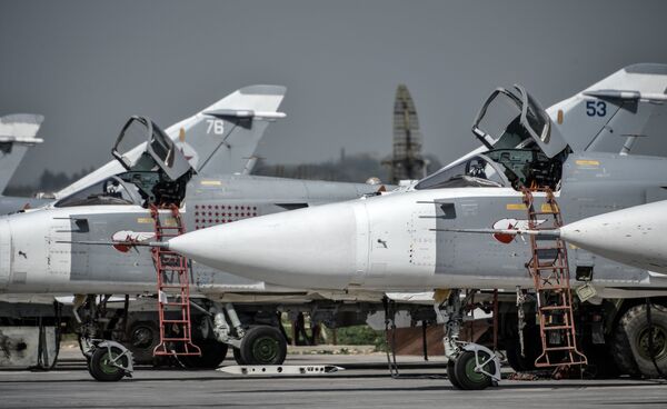 Russian Su-24 tactical bombers at the Hmeimim airbase in the Latakia Governorate of Syria Russian Su-24 tactical bombers at the Hmeimim airbase in the Latakia Governorate of Syria - Sputnik International