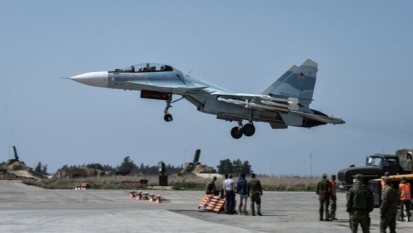 A Russian Air Force Su-30 aircraft takes off from the Hmeimim airbase - Sputnik International