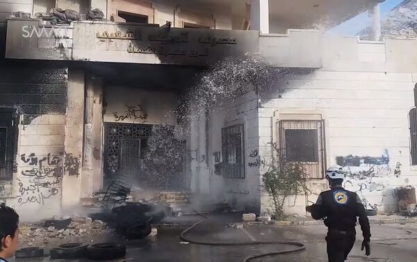 Burnt headquarters of al-Nusra Fron in Maarat al-Numa - Sputnik International