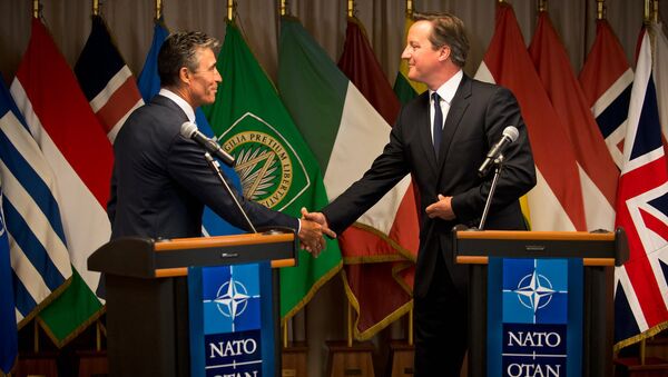 UK PM David Cameron (right) and former Secretary General of NATO Anders Fogh Rasmussen - Sputnik International