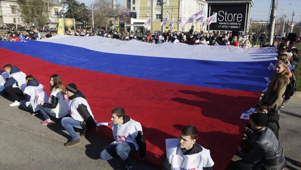 Scene from official celebrations organized in Simferopol marking the second anniversary of the referendum to determine Crimea's fate. - Sputnik International