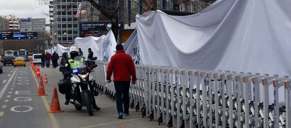 Security officials at Sunday's explosion site covered by large white sheeting in Ankara, Turkey, Tuesday, March 15, 2016 Security officials at Sunday's explosion site covered by large white sheeting in Ankara, Turkey, Tuesday, March 15, 2016 - Sputnik International