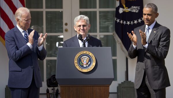 Federal appeals court judge Merrick Garland, receives applauds from President Barack Obama and Vice President Joe Biden as he is introduced as Obama's nominee for the Supreme Court during an announcement in the Rose Garden of the White House, in Washington, Wednesday, March 16, 2016 - Sputnik International