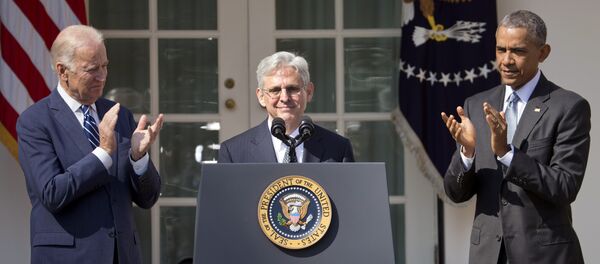 Federal appeals court judge Merrick Garland, receives applauds from President Barack Obama and Vice President Joe Biden as he is introduced as Obama's nominee for the Supreme Court during an announcement in the Rose Garden of the White House, in Washington, Wednesday, March 16, 2016 - Sputnik International