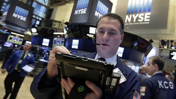 Trader Jonathan Corpina works on the floor of the New York Stock Exchange, Wednesday, March 16, 2016 - Sputnik International