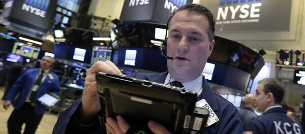 Trader Jonathan Corpina works on the floor of the New York Stock Exchange, Wednesday, March 16, 2016 - Sputnik International