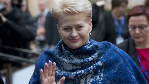 Lithuanian President Dalia Grybauskaite waves as she arrives for an EU summit in Brussels on Thursday, March 17, 2016. - Sputnik International