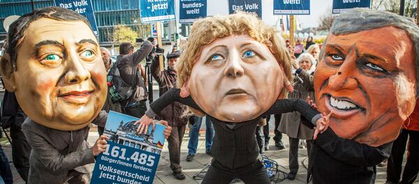 Protesters wearing masks of Sigmar Gabriel, Angela Merkel and Horst Seehofer. Protesters wearing masks of Sigmar Gabriel, Angela Merkel and Horst Seehofer. - Sputnik International