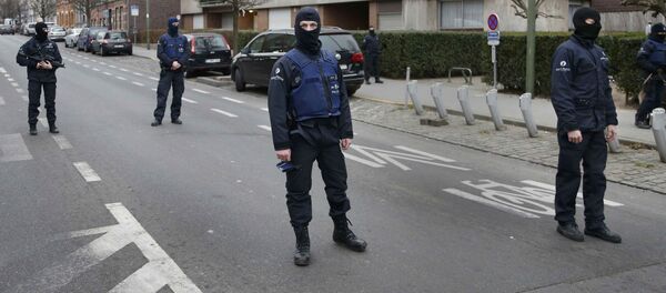 Police at the scene of a security operation in the Brussels suburb of Molenbeek in Brussels Police at the scene of a security operation in the Brussels suburb of Molenbeek in Brussels - Sputnik International