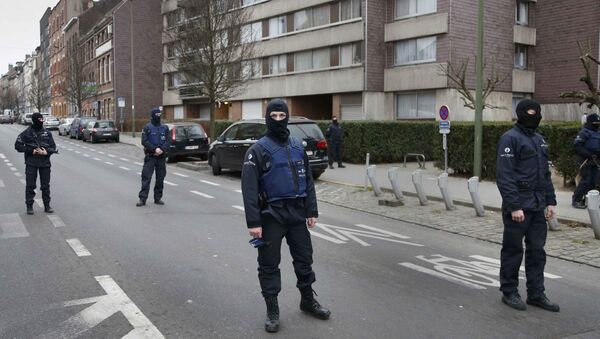Police at the scene of a security operation in the Brussels suburb of Molenbeek in Brussels - Sputnik International