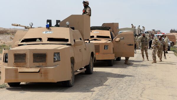 The Desert Falcons self-defense unit re-deploy outside Palmyra, Syria. - Sputnik International
