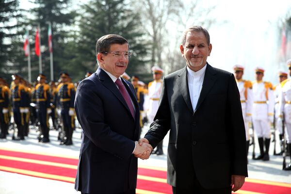 Turkish Prime Minister Ahmet Davutoglu, left, shakes hands with Iranian Vice-President Eshagh Jahangiri during his official welcoming ceremony at the Saadabad Palace in Tehran, Iran, Saturday, March 5, 2016 Turkish Prime Minister Ahmet Davutoglu, left, shakes hands with Iranian Vice-President Eshagh Jahangiri during his official welcoming ceremony at the Saadabad Palace in Tehran, Iran, Saturday, March 5, 2016 - Sputnik International