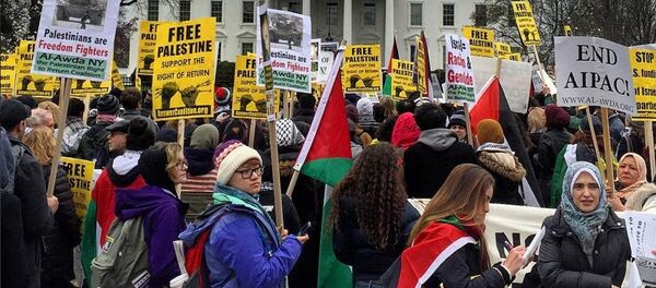 Activists protest US policy concerning US foreign policy regarding the Middle East in front of the White House on March 20, 2016 Activists protest US policy concerning US foreign policy regarding the Middle East in front of the White House on March 20, 2016 - Sputnik International