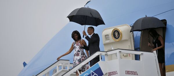 President Barack Obama and his wife Michelle exit Air Force One as they arrive at Havana's international airport for a three-day trip, in Havana March 20, 2016 President Barack Obama and his wife Michelle exit Air Force One as they arrive at Havana's international airport for a three-day trip, in Havana March 20, 2016 - Sputnik International