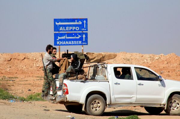 Syrian pro-government forces advance on a road through the town of Khanasser after they reportedly recaptured it from Daesh terrorists on February 29, 2016 Syrian pro-government forces advance on a road through the town of Khanasser after they reportedly recaptured it from Daesh terrorists on February 29, 2016 - Sputnik International