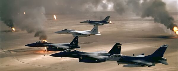 USAF aircraft of the 4th Fighter Wing (F-16, F-15C and F-15E) fly over Kuwaiti oil fires, set by the retreating Iraqi army during Operation Desert Storm in 1991 USAF aircraft of the 4th Fighter Wing (F-16, F-15C and F-15E) fly over Kuwaiti oil fires, set by the retreating Iraqi army during Operation Desert Storm in 1991 - Sputnik International