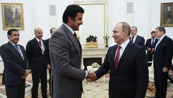 President Vladimir Putin meets with Qatar Emir Tamim bin Hamad Al-Thani. File photo - Sputnik International