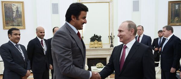 President Vladimir Putin meets with Qatar Emir Tamim bin Hamad Al-Thani. File photo - Sputnik International