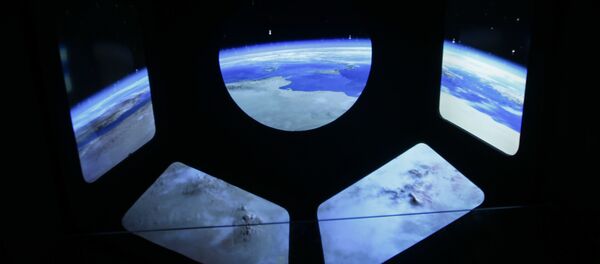 Once completed, the ground elements will eventually be supplemented by a trio of high-orbit satellites that will actually detect gravitational waves. Above: A reproduction of the view of the earth from a spaceship. Once completed, the ground elements will eventually be supplemented by a trio of high-orbit satellites that will actually detect gravitational waves. Above: A reproduction of the view of the earth from a spaceship. - Sputnik International