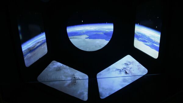 Once completed, the ground elements will eventually be supplemented by a trio of high-orbit satellites that will actually detect gravitational waves.  Above: A reproduction of the view of the earth from a spaceship. - Sputnik International
