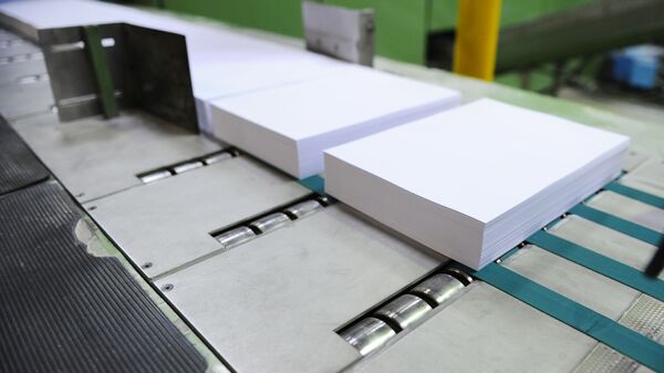 Paper being manufactured on a production line - Sputnik International