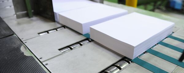 Paper being manufactured on a production line - Sputnik International