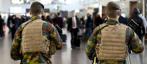 Military police soldiers patrol the Brussels Airport on in Zaventem, eastern Brussels (File) Military police soldiers patrol the Brussels Airport on in Zaventem, eastern Brussels (File) - Sputnik International