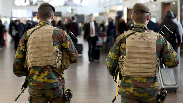 Military police soldiers patrol the Brussels Airport on in Zaventem, eastern Brussels (File) - Sputnik International