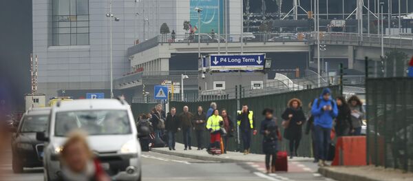 People leave the scene of explosions at Zaventem airport near Brussels, Belgium, March 22, 2016 People leave the scene of explosions at Zaventem airport near Brussels, Belgium, March 22, 2016 - Sputnik International